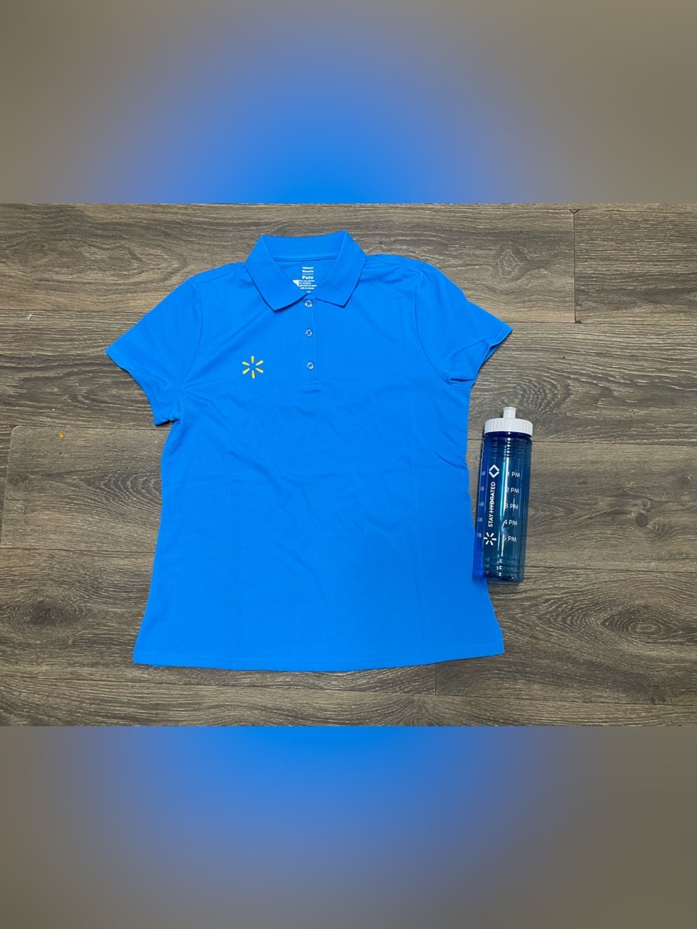 New Bright Blue Walmart Women's Polo Shirt Yellow Starburst Logo water bottle